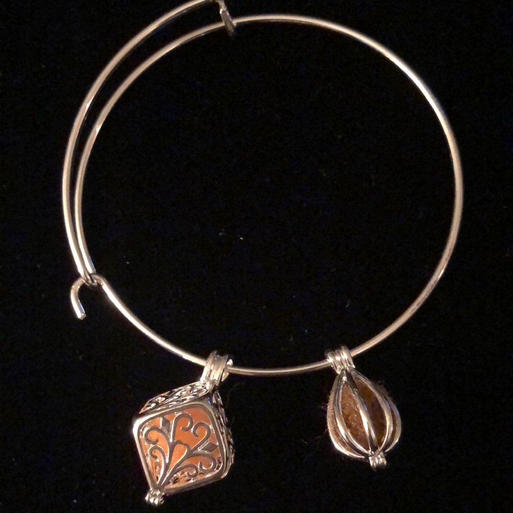 Essential oil, aromatherapy diffuser bracelet with inter changing  pom-poms.